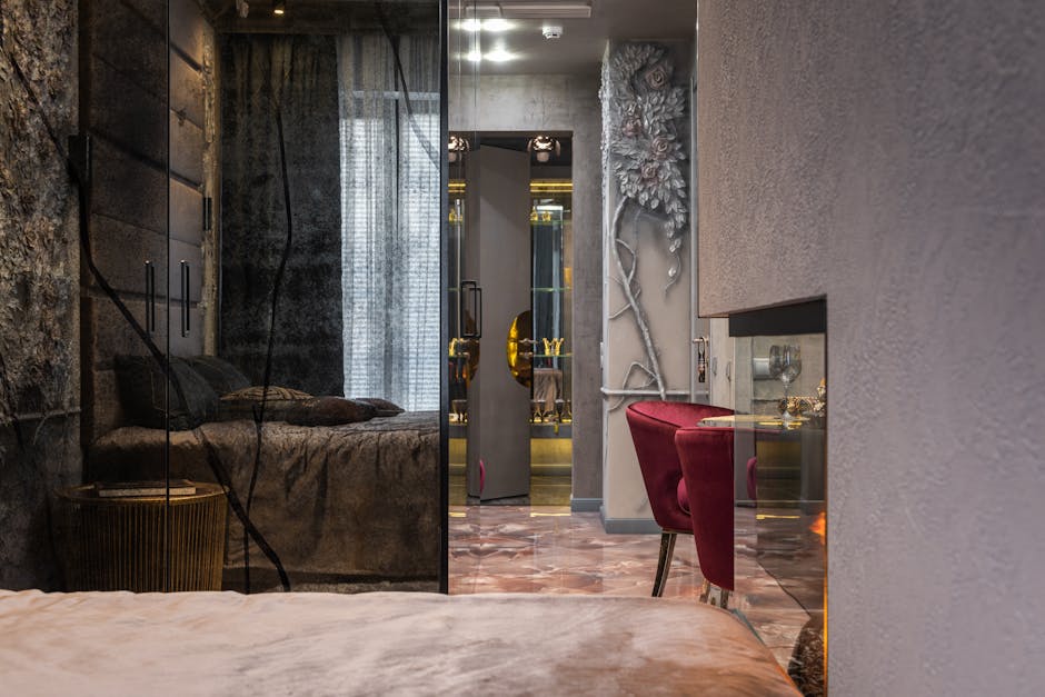 Stylish interior of a cozy modern bedroom with chic decor and warm lighting.