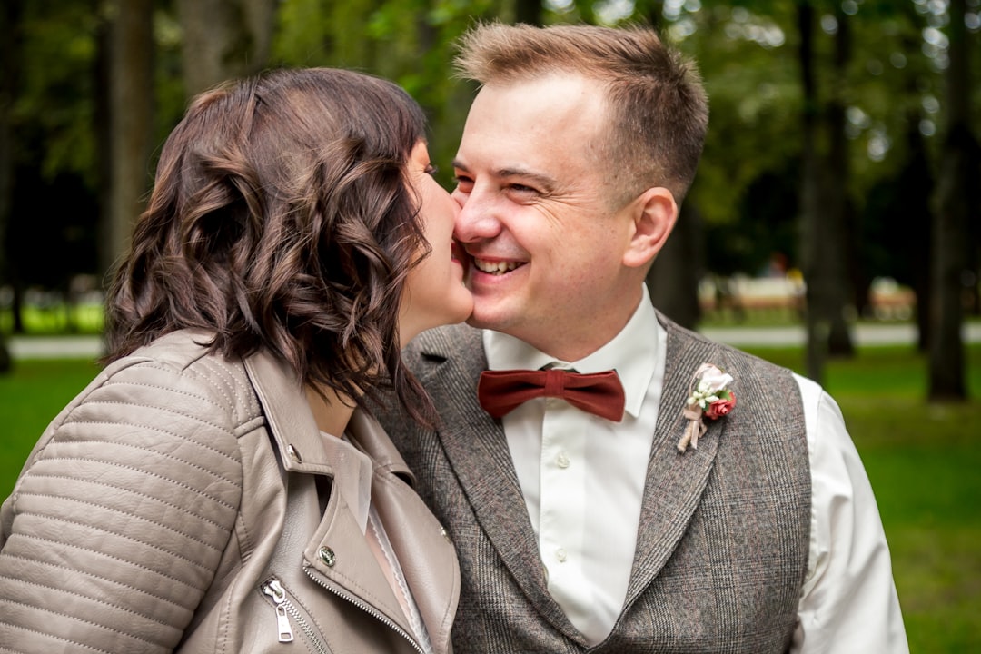 a couple of people that are kissing each other