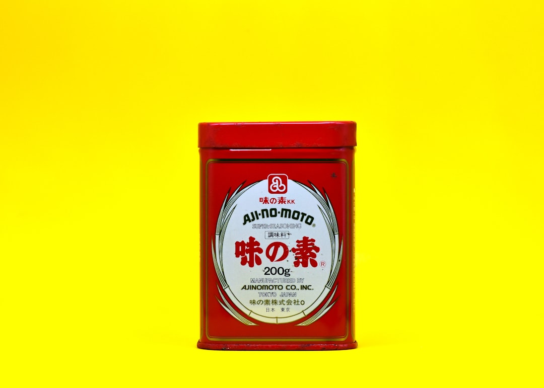 a tin of food on a yellow background