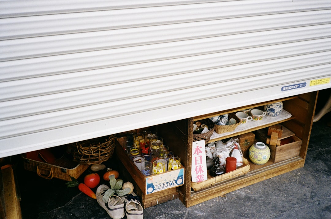 A garage with a lot of items under it